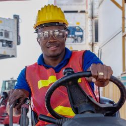 smiling african american forklift driver